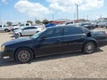 2004 Cadillac Deville — photo 14 of 16 | VIN 1G6KE57Y84U120195