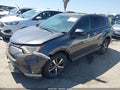 2018 Toyota RAV4 — photo 2 of 15 | VIN 2T3RFREV9JW800923