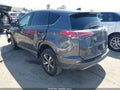 2018 Toyota RAV4 — photo 3 of 15 | VIN 2T3RFREV9JW800923
