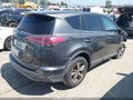 2018 Toyota RAV4 — photo 4 of 15 | VIN 2T3RFREV9JW800923