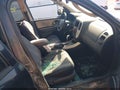 2005 Mercury Mariner — photo 5 of 18 | VIN 4M2CU57115DJ15889