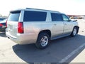 2015 Chevrolet Suburban — photo 4 of 16 | VIN 1GNSCJKCXFR144549