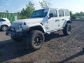 2018 Jeep Wrangler Unlimited — photo 2 of 11 | VIN 1C4HJXEG6JW214052