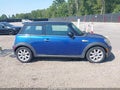 2009 Mini Cooper — photo 13 of 16 | VIN WMWMF73539TT94960