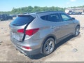 2018 Hyundai Santa Fe — photo 4 of 16 | VIN 5NMZU3LB1JH054581