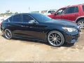 2015 Infiniti Q50 — photo 13 of 16 | VIN JN1BV7AR1FM391308