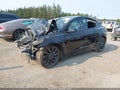 2023 Tesla Model Y — photo 2 of 20 | VIN 7SAYGDEF2PF748248