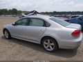 2014 Volkswagen Passat — photo 14 of 16 | VIN 1VWBS7A39EC113761