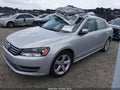 2014 Volkswagen Passat — photo 2 of 16 | VIN 1VWBS7A39EC113761