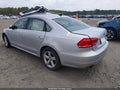2014 Volkswagen Passat — photo 3 of 16 | VIN 1VWBS7A39EC113761