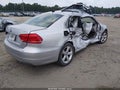 2014 Volkswagen Passat — photo 4 of 16 | VIN 1VWBS7A39EC113761