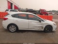 2021 Subaru Impreza — photo 13 of 16 | VIN 4S3GTAB62M3715069