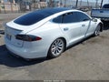 2014 Tesla Model S — photo 4 of 16 | VIN 5YJSA1H18EFP35083
