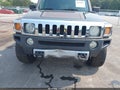 2009 Hummer H3 — photo 6 of 16 | VIN 5GTEN13EX98111862