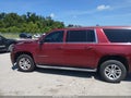 2016 Chevrolet Suburban — photo 13 of 15 | VIN 1GNSCHKC2GR238418