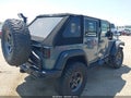 2013 Jeep Wrangler Unlimited — photo 4 of 16 | VIN 1C4HJWFG6DL678988