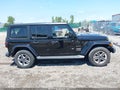 2020 Jeep Wrangler Unlimited — photo 13 of 16 | VIN 1C4HJXEGXLW239829