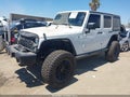2017 Jeep Wrangler Unlimited — photo 2 of 15 | VIN 1C4HJWDG2HL575978