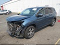 2016 Honda Pilot — photo 2 of 17 | VIN 5FNYF6H80GB022381