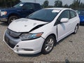 2010 Honda Insight — photo 2 of 18 | VIN JHMZE2H74AS036610