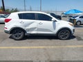 2014 Kia Sportage — photo 13 of 16 | VIN KNDPBCAC4E7618116