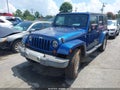 2009 Jeep Wrangler Unlimited — photo 2 of 16 | VIN 1J4GA59139L765388