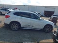 2018 BMW X1 — photo 13 of 16 | VIN WBXHT3C38J5K21242