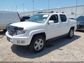 2013 Honda Ridgeline — photo 2 of 19 | VIN 5FPYK1F59DB012328