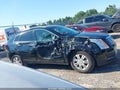 2016 Cadillac SRX — photo 13 of 16 | VIN 3GYFNBE3XGS560499