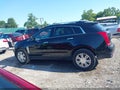 2016 Cadillac SRX — photo 14 of 16 | VIN 3GYFNBE3XGS560499