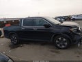 2019 Honda Ridgeline — photo 13 of 16 | VIN 5FPYK3F74KB019410
