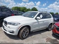 2014 BMW X5 — photo 15 of 19 | VIN 5UXKR0C53E0K51770
