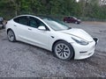 2021 Tesla Model 3 — photo 1 of 15 | VIN 5YJ3E1EAXMF870013