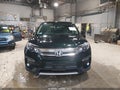 2019 Honda Pilot — photo 12 of 16 | VIN 5FNYF6H38KB055075