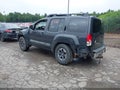 2015 Nissan Xterra — photo 3 of 16 | VIN 5N1AN0NW6FN663390