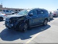 2017 Honda Pilot — photo 2 of 17 | VIN 5FNYF5H99HB011030