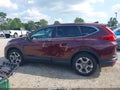 2017 Honda CR-V — photo 14 of 16 | VIN 5J6RW2H5XHL026921