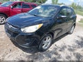2012 Hyundai Tucson — photo 2 of 12 | VIN KM8JU3AC0CU500364