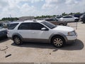 2008 Ford Taurus — photo 13 of 16 | VIN 1FMDK02W08GA32300