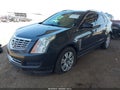 2014 Cadillac SRX — photo 2 of 16 | VIN 3GYFNBE3XES545143