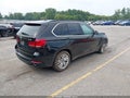 2014 BMW X5 — photo 4 of 16 | VIN 5UXKR0C53E0H18138