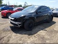 2024 Tesla Model Y — photo 2 of 17 | VIN 7SAYGDEE6RA236869