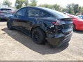2024 Tesla Model Y — photo 3 of 17 | VIN 7SAYGDEE6RA236869