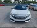 2016 Honda Civic — photo 12 of 16 | VIN 2HGFC1F34GH660140