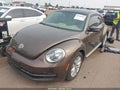 2014 Volkswagen Beetle — photo 2 of 15 | VIN 3VWJL7AT2EM633534
