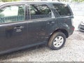 2010 Mercury Mariner — photo 6 of 11 | VIN 4M2CN8B77AKJ22927