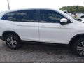 2016 Honda Pilot — photo 13 of 17 | VIN 5FNYF6H57GB066271