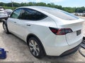 2023 Tesla Model Y — photo 3 of 24 | VIN 7SAYGDEE3PF863593