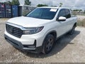 2021 Honda Ridgeline — photo 2 of 16 | VIN 5FPYK3F58MB023459