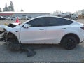 2023 Tesla Model Y — photo 14 of 21 | VIN 7SAYGDEE0PA118426
